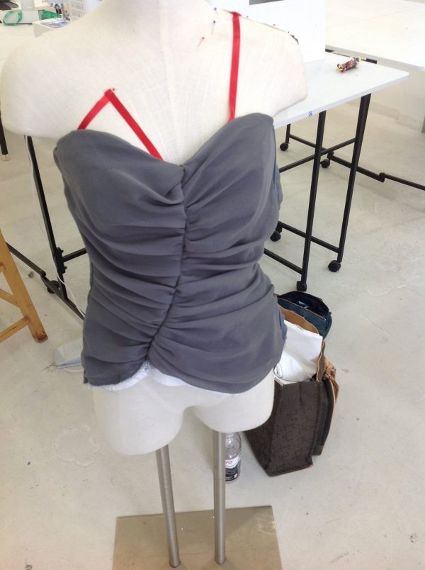 The front bodice section of Vogue #2890 as constructed by Jae before attaching the skirt at the Tchad sewing studio workrooms in Chicago