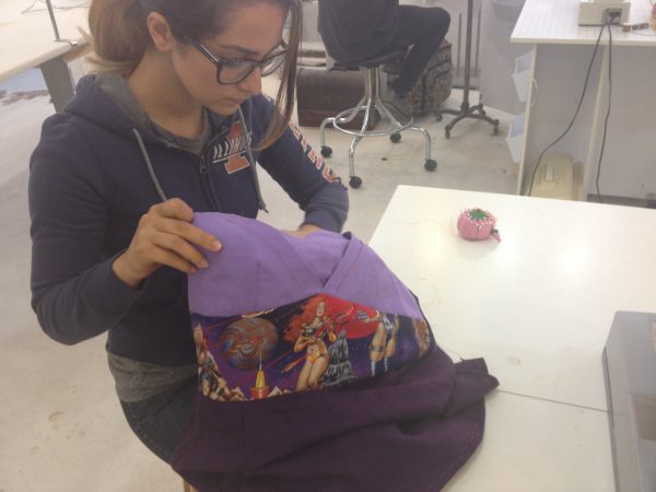 Maddie works out the details on McCall's #6830 in purple linen and Barbarella print cotton