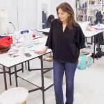 Peggy Asherman modeling her adapted Helmut Lang kimono cut blouse in black crepe at the Tchad workroom sewing studio in Chicago