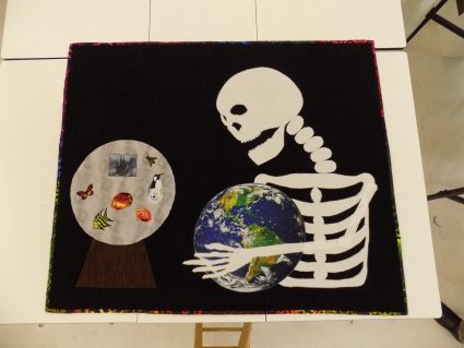 Melissa Dessent submits her finished art quilt to the Houston Quilt Show.
