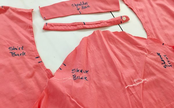 Details of a polo shirt that has been deconstructed as part of a student project at the Tchad sewing workroom in Chicago.
