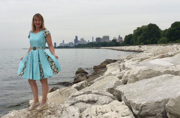 Erin Benoit poses on the breakers at Montrose Harbor in Chicago in her first project at Tchad Sewing Classes in Chicago
