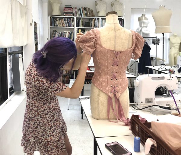 Kat Jarboe finishes her corset for a photoshoot at the end of the Summer at the Tchad workrooms and sewing studio in Uptown Chicago - sewing classes in Chicgao have never been more interesting and productive.